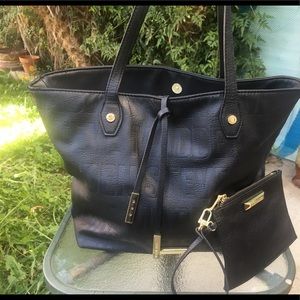 Steve Madden black bag with wristlet.